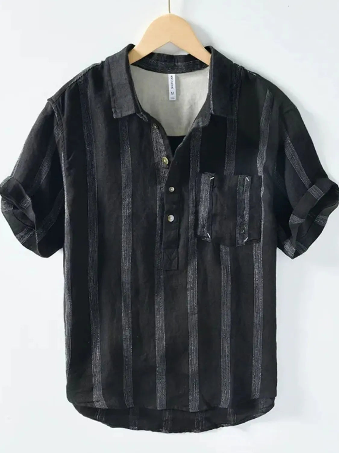 Model wearing button detail short sleeve shirt styled casually