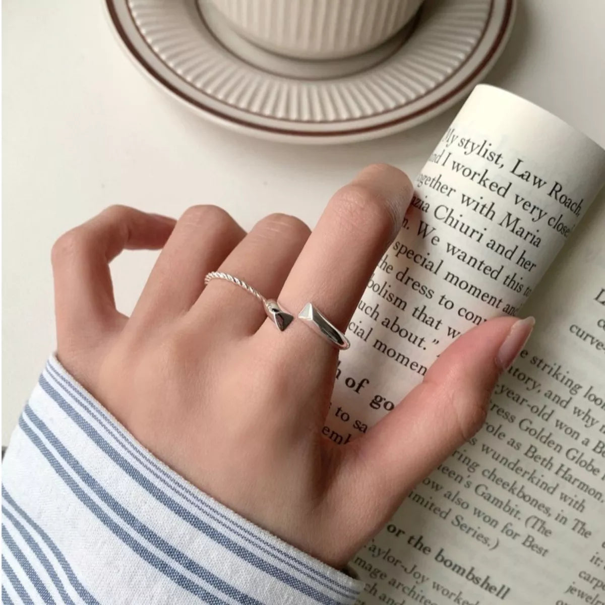 Close-up of the high-luster sterling silver finish and the smooth architectural curve