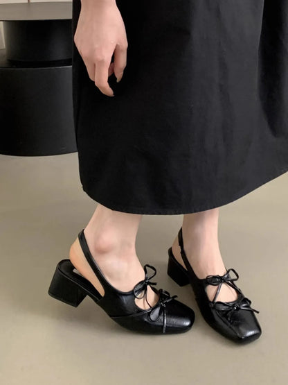Model wearing square toe slingbacks styled with cropped trousers for a city look