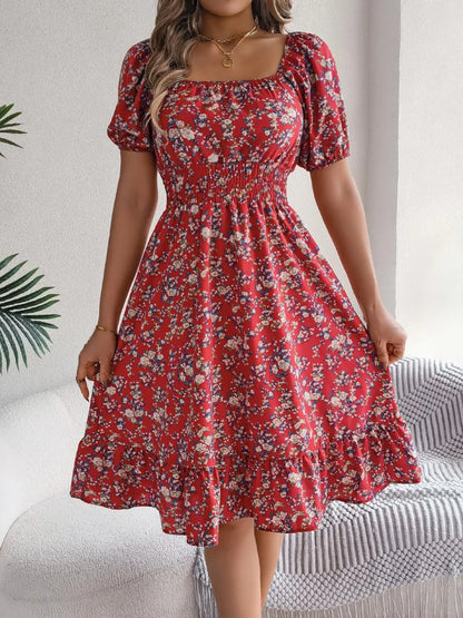 Close-up of the intricate smocked texture and delicate ruffled hemline