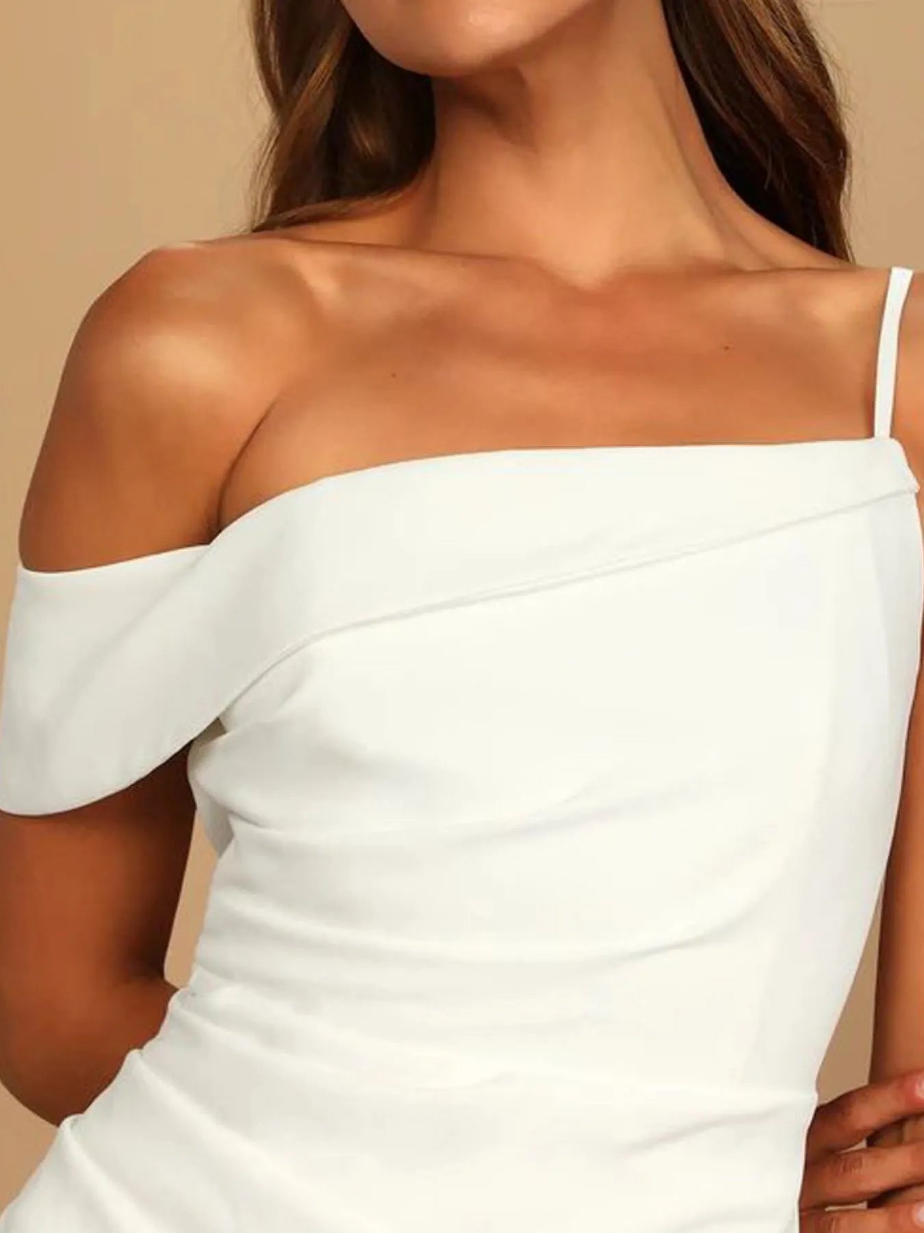 Close-up of asymmetrical neckline and front slit on Midi Dress