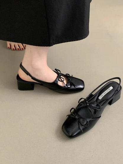 Front view of the square toe slingback ballet shoes with bow-tie detailing