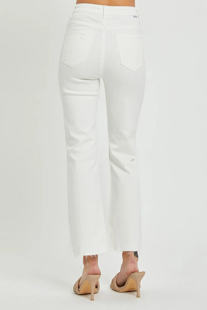 Model wearing high-rise button fly jeans 