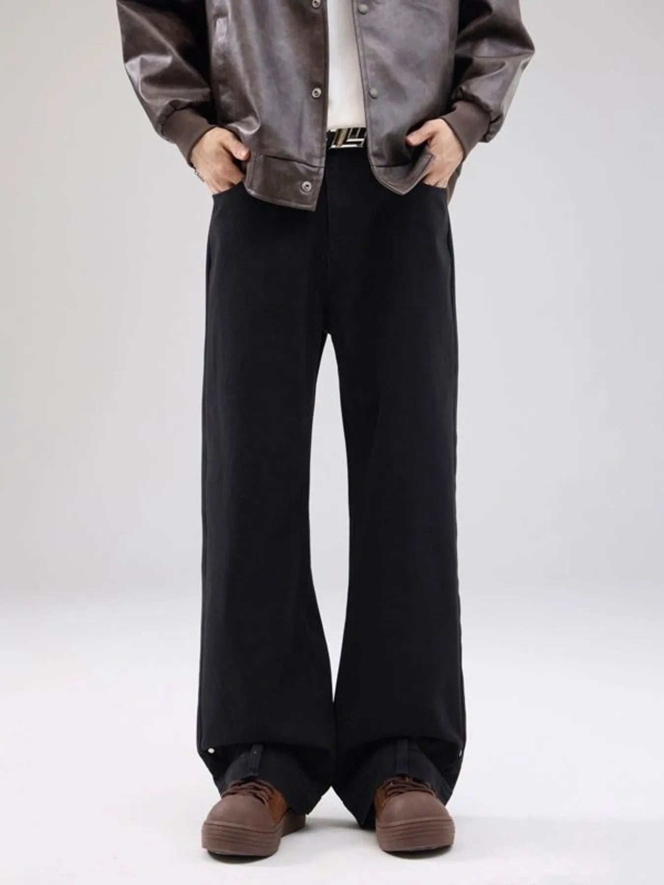 Model wearing wide leg stretch jeans styled casually