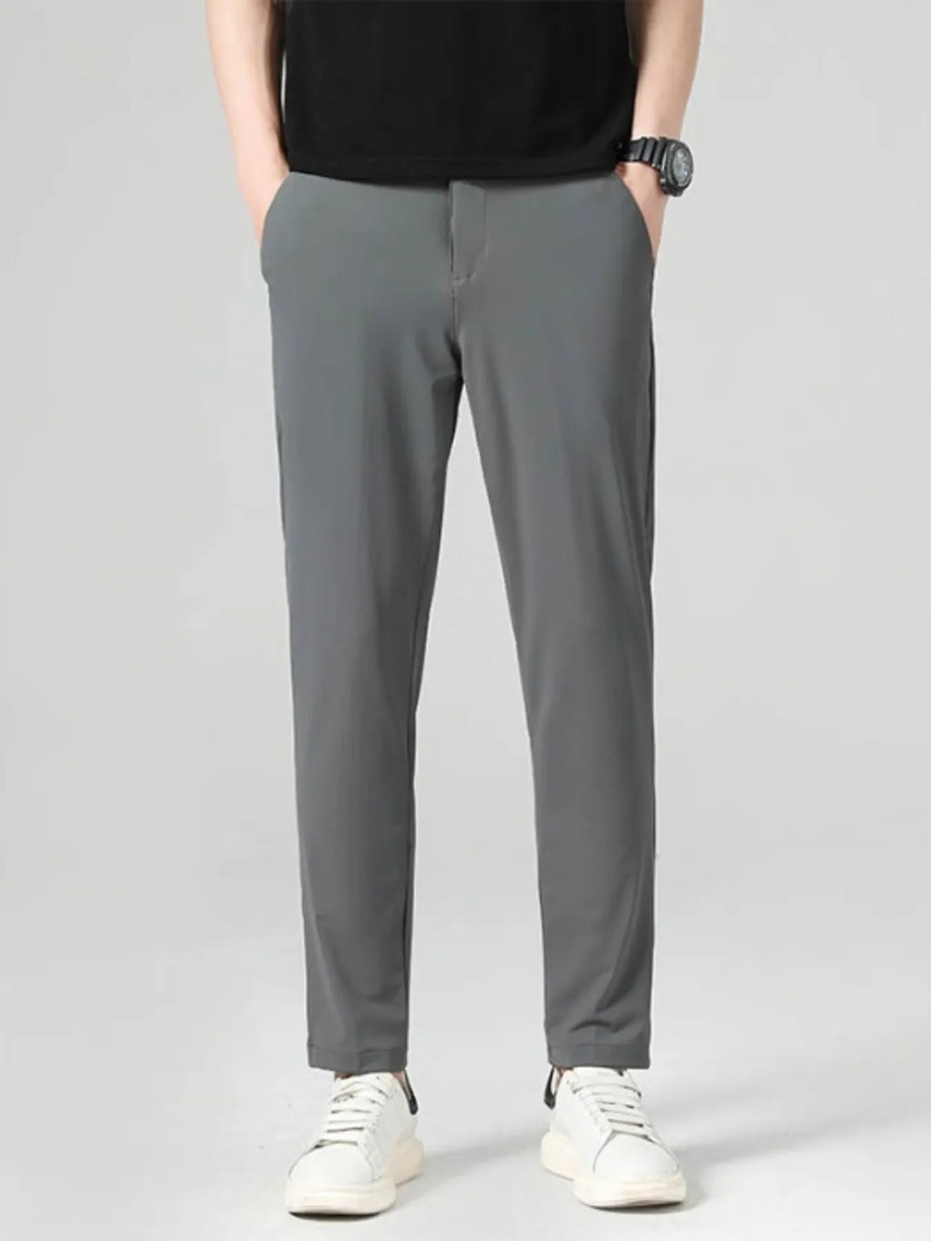 Model wearing loose fit stretch pants styled casually