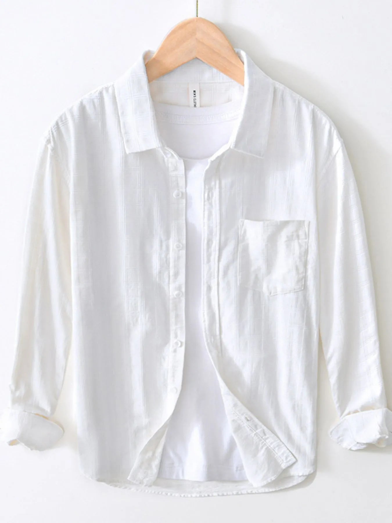 Front view of striped cotton blend button-up shirt with pocket