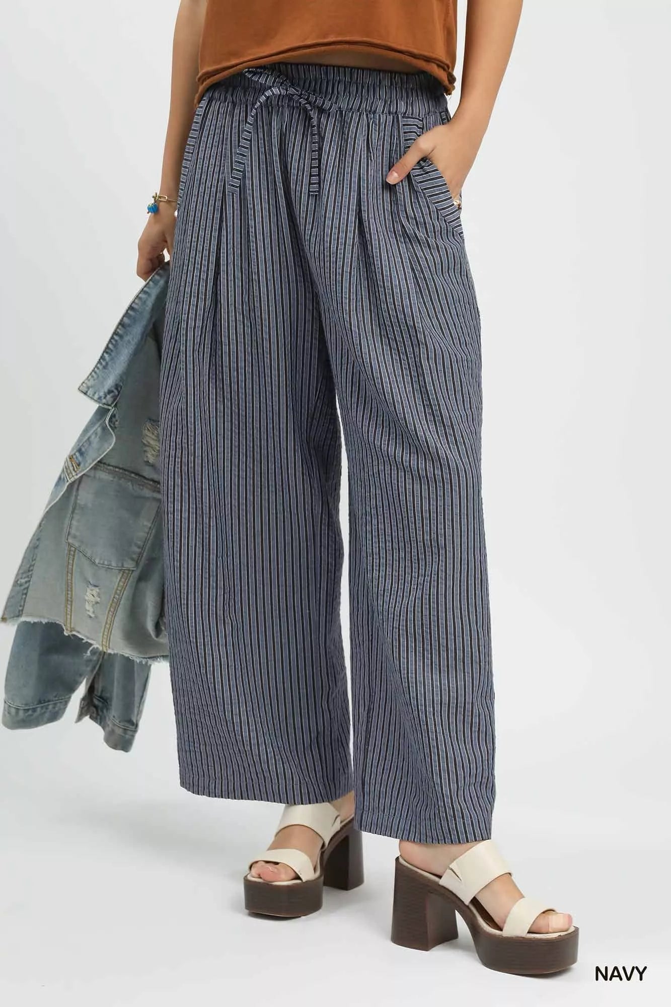 Front view of Umgee drawstring wide-leg pants in a classic stripe pattern