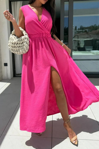 Model wearing surplice sleeveless slit maxi dress styled elegantly