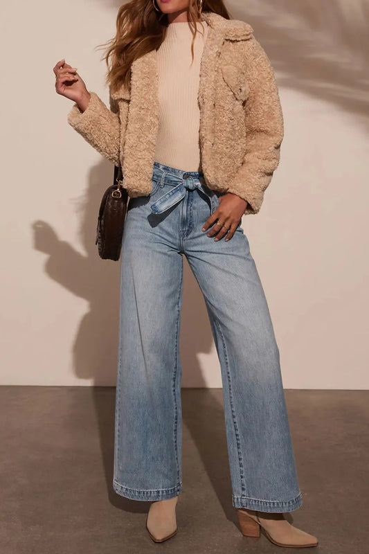 Front view of tied wide leg trousers in a sophisticated fluid drape