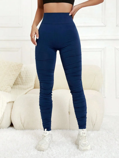 Close-up of the supportive high-waistband and dimensional ruching construction