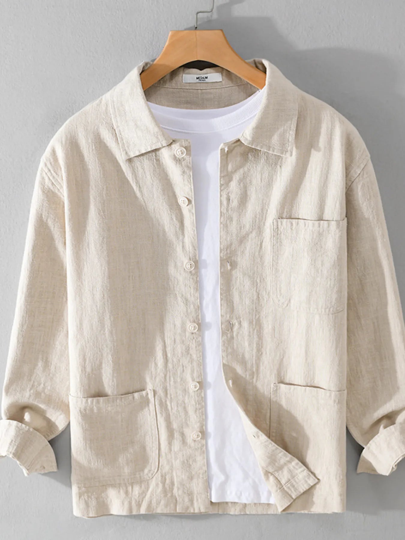 Close-up of chest pocket and washed linen texture on shirt