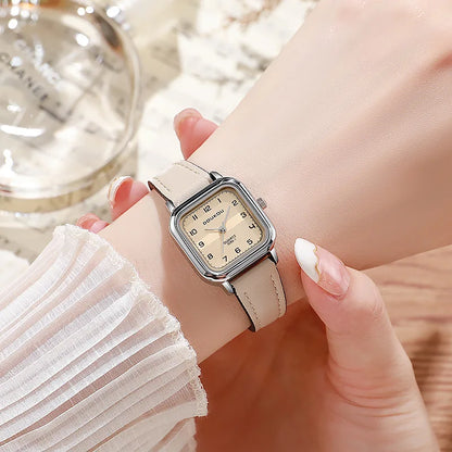 Close-up of the elegant steel strip band and the luminous finish of the square alloy case