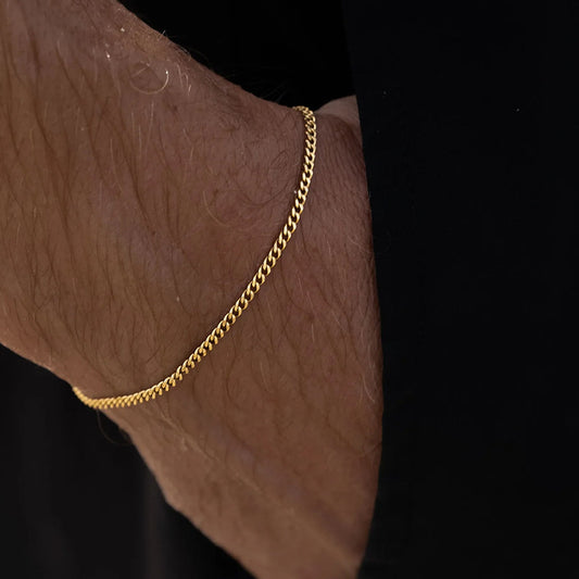Front view of the 2cm wide gold electroplated stainless steel Cuban link bracelet