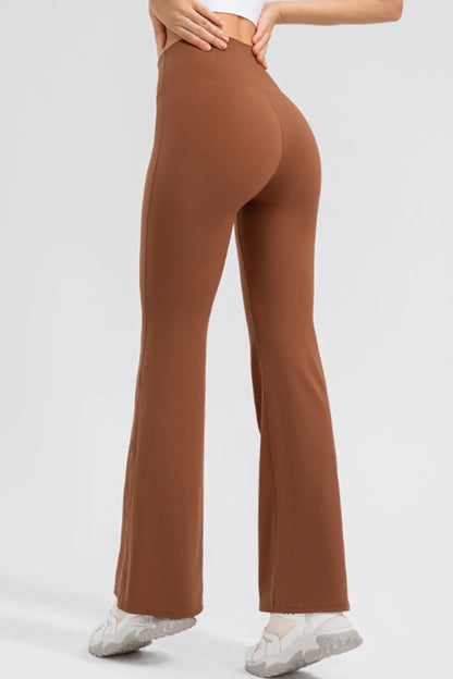 Close-up of the reinforced wide waistband and architectural bootcut hem